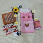 Pink Katan Saree Gift Hamper with Jewelry, Lipstick Set, Bangles & Chocolates