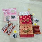 Red Katan Saree Gift Hamper with Jewelry, Bangles, Pearl set & Chocolates